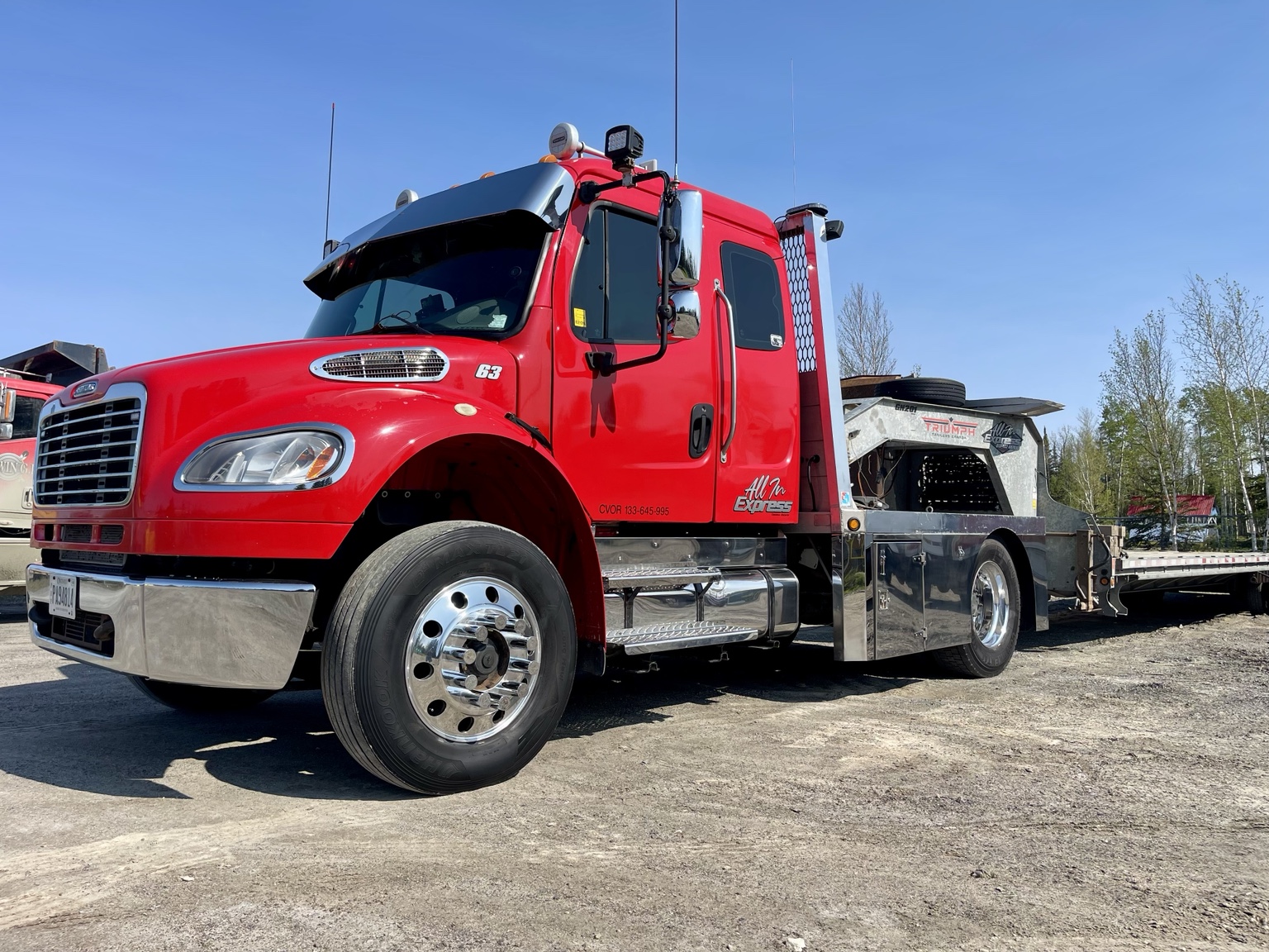 Red Freightliner heavy haul truck